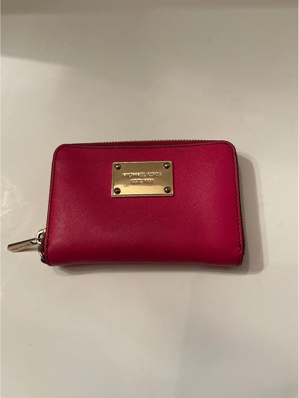 Michael Kors Pink leather zip-around wallet with logo and card slots